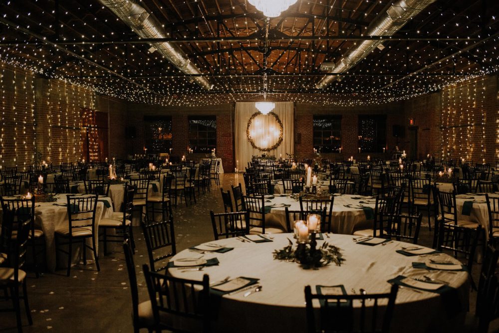 Indoor event space at The Hudson. Space features high ceiling and beautiful lighting.